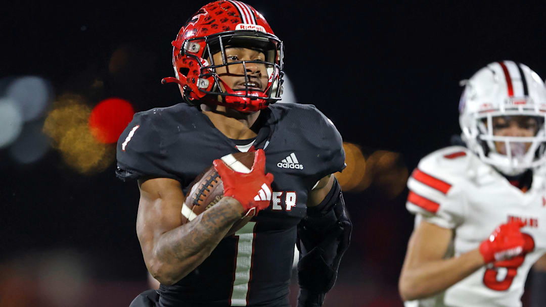 Jabree Wallace-Coleman of Imhotep Charter runs the ball during the 2023 PIAA Class 5A state championship game against Peters Township.