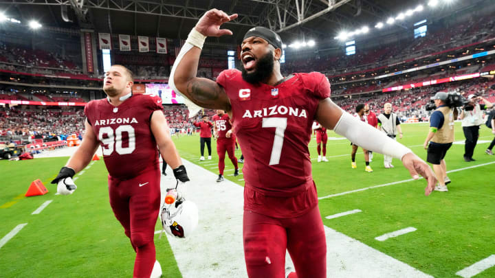 Arizona Cardinals linebacker Kyzir White (7) celebrates their 28-16 win over the Dallas Cowboys at State Farm Stadium in Glendale on Sept. 24, 2023.