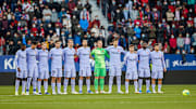 Barcelona players are seen in the minute of the silence...
