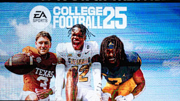 A commercial for the College Football 25 video game, featuring Texas Football quarterback Quinn Ewers plays during the fifth inning of the Longhorns' baseball game against the Kansas Jayhawks, Thursday, May 16, 2024 at UFCU Disch-Falk Field in Austin.