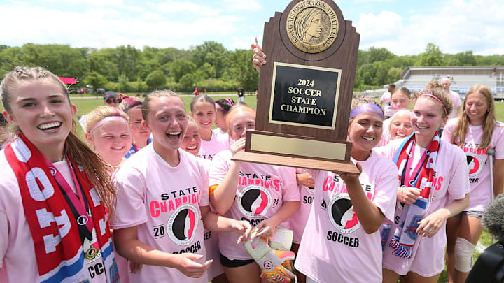 Nevada celebrates after winning the Class 1A girls state soccer title last spring.