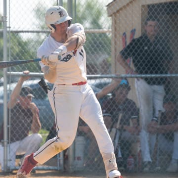 Central Bucks East's Chase Harlan (11) hits against Garnet Valley during their PIAA Class 6A District One playoff second-round game in Doylestown on Wednesday, May 22, 2024.