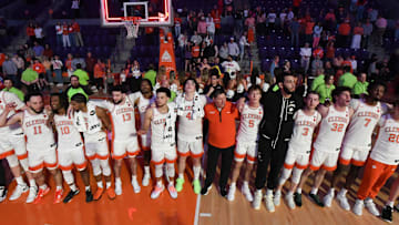 Feb 26, 2025; Clemson, South Carolina, USA; Clemson team celebrates their win against Notre Dame at Littlejohn Coliseum.