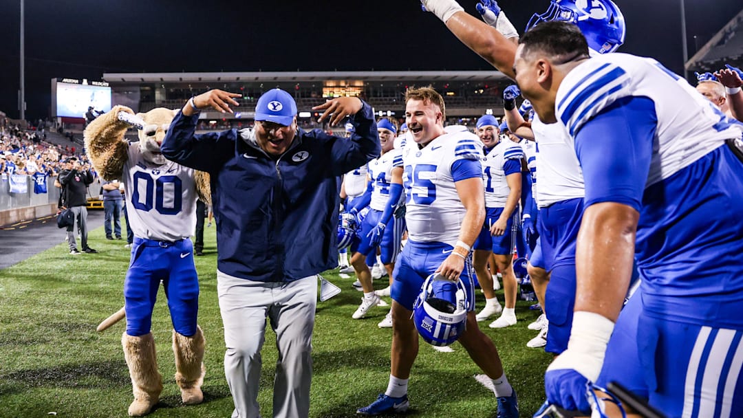 Brigham Young Cougars head coach Kalani Sitake celebrates a win against the Arizona Wildcats. Brigham Young Cougars head coach Kalani Sitake celebrates a win against the Arizona Wildcats.