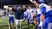 Brigham Young Cougars head coach Kalani Sitake celebrates a win against the Arizona Wildcats.