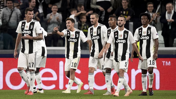 Paulo Dybala (C) of Juventus FC celebrates after scoring a...