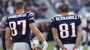 New England Patriots tight end Rob Gronkowski and tight end Aaron Hernandez watch from the sideline as they take on the Buffalo Bills in the second quarter at Gillette Stadium. 