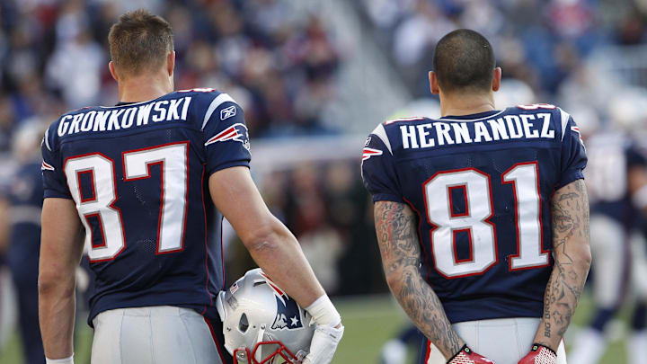 New England Patriots tight end Rob Gronkowski and tight end Aaron Hernandez watch from the sideline as they take on the Buffalo Bills in the second quarter at Gillette Stadium. New England Patriots tight end Rob Gronkowski and tight end Aaron Hernandez watch from the sideline as they take on the Buffalo Bills in the second quarter at Gillette Stadium.