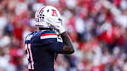 Sep 12, 2025; Tucson, Arizona, USA; Arizona Wildcats running back Ismail Mahdi (21) wears the retro helmet for the start of the game against the Kansas State Wildcats at Arizona Stadium. Mandatory Credit: Aryanna Frank-Imagn Images