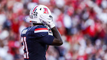Sep 12, 2025; Tucson, Arizona, USA; Arizona Wildcats running back Ismail Mahdi (21) wears the retro helmet for the start of the game against the Kansas State Wildcats at Arizona Stadium. Mandatory Credit: Aryanna Frank-Imagn Images