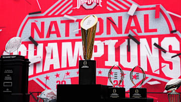 The championship trophies sit on the stage during the Ohio State Buckeyes College Football Playoff National Championship celebration at Ohio Stadium in Columbus on Jan. 26, 2025.