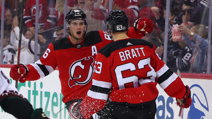 Jack Hughes and Jesper Bratt celebrate. Mandatory Credit: Ed Mulholland-USA TODAY Sports