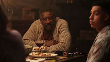Pictured (L-R): Ernie Hudson as Reverend Peters and Marcus Scribner as Jonah Silver in Boston Blue season 1