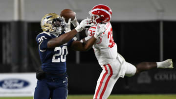 Mater Dei linebacker Abduall Sanders Jr. intercepts a pass against St. John Bosco in the 2023 CIF Southern Section Division 1 final at the LA Memorial Coliseum.