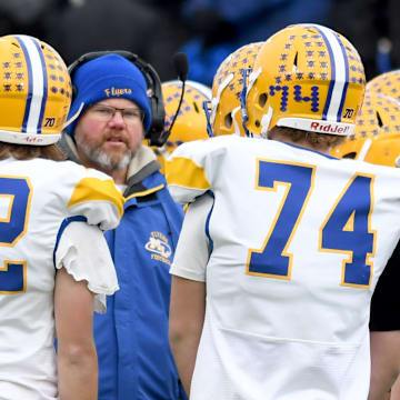 Marion Local coach Tim Goodwin talks to players during a first-quarter timeout against Hillsdale in the Division VII state finals, Friday, Dec. 6, 2024, in Canton.