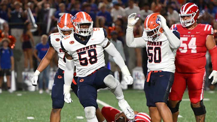 Bishop Gorman defensive tackle James Carrington celebrates after sacking Mater Dei quarterback Ashton Beierly.