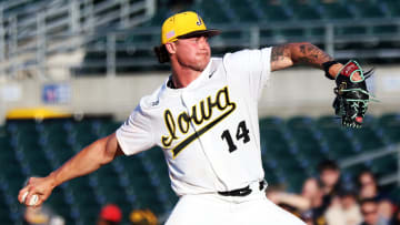Brody Brecht (14) of Iowa throws strikes as the Florida International University Panthers play the Iowa Hawks in a three-game series at Principal Park in Des Moines on Thursday, May 16, 2024.