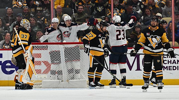 The Blue Jackets celebrate a goal against the Pittsburgh Penguins.
