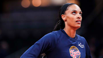 Indiana Fever forward DeWanna Bonner (25) warms up Tuesday, May 20, 2025, during a game between the Indiana Fever and the Atlanta Dream at Gainbridge Fieldhouse in Indianapolis.