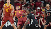 Cincinnati Bearcats guard Jizzle James (2) pushes Iowa State Cyclones guard Tamin Lipsey (3) as driving with the ball gets an offensive foul during the second half in the Big-12 men’s basketball at Hilton Coliseum on Feb. 15, 2025, in Ames, Iowa.