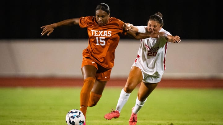 Texas Longhorns forward Trinity Byars (15) battles Houston Cougars midfielder Talia Feigin (20) while dribbling the ball in the second half of the Longhorn's season opener against the Houston Cougars, Aug. 15, 2024 at Mike A. Meyers Stadium and Soccer Field in Austin, Texas. Texas won the game 1-0.