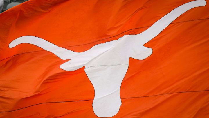 A Texas Longhorns flag is flown to celebrate a touchdown in the third quarter of the Longhorns' spring Orange and White game at Darrell K Royal Texas Memorial Stadium in Austin, Texas, April 20, 2024.