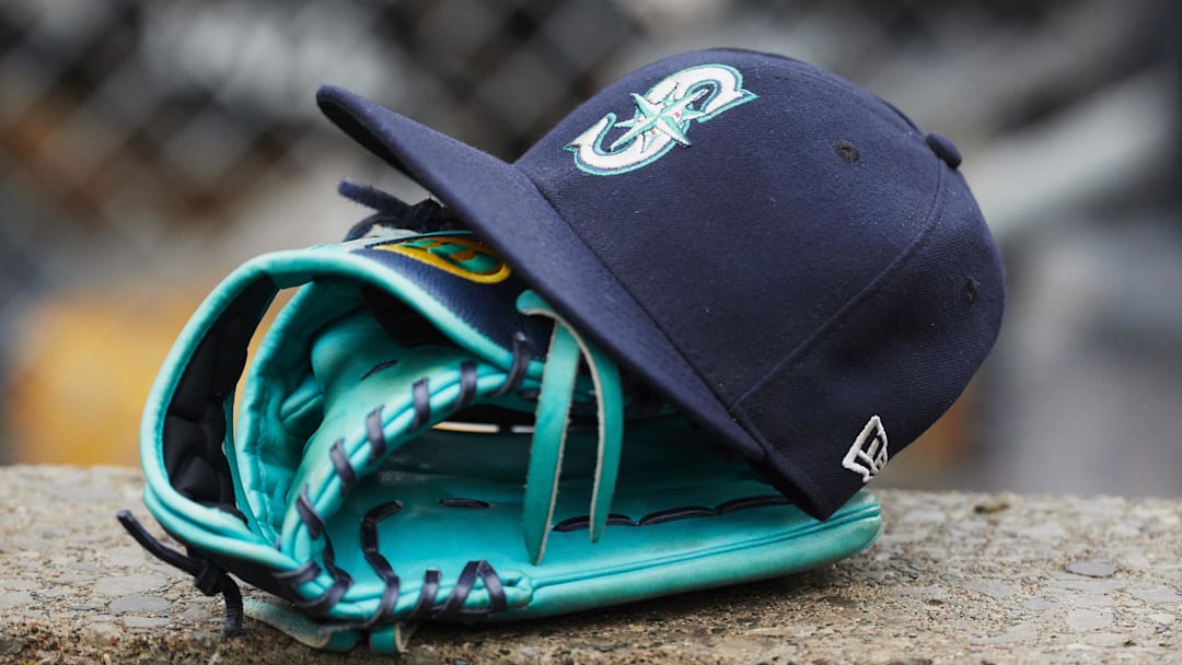 May 12, 2018; Detroit, MI, USA; Hat and glove of Seattle Mariners center fielder Dee Gordon (9) sits in dugout during the third inning against the Detroit Tigers at Comerica Park. Mandatory Credit: Rick Osentoski-Imagn Images