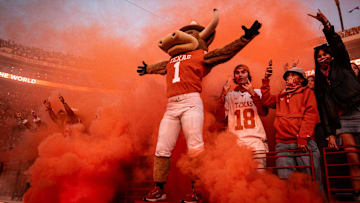 Texas mascot Hook 'Em stands in front of the student section as smoke billows onto the field between the third and fourth quarter as the Texas Longhorns play the Clemson Tigers.
