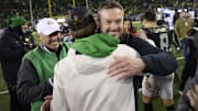 Nov 30, 2024; Eugene, Oregon, USA; Oregon Ducks head coach Dan Lanning celebrates after beating the Washington Huskies at Autzen Stadium. Mandatory Credit: Troy Wayrynen-Imagn Images