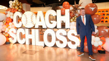 University of Texas baseball coach Jim Schlossnagle poses for photos at his introductory news conference at the Frank Denius Family University Hall of Fame Wednesday June 26, 2024.