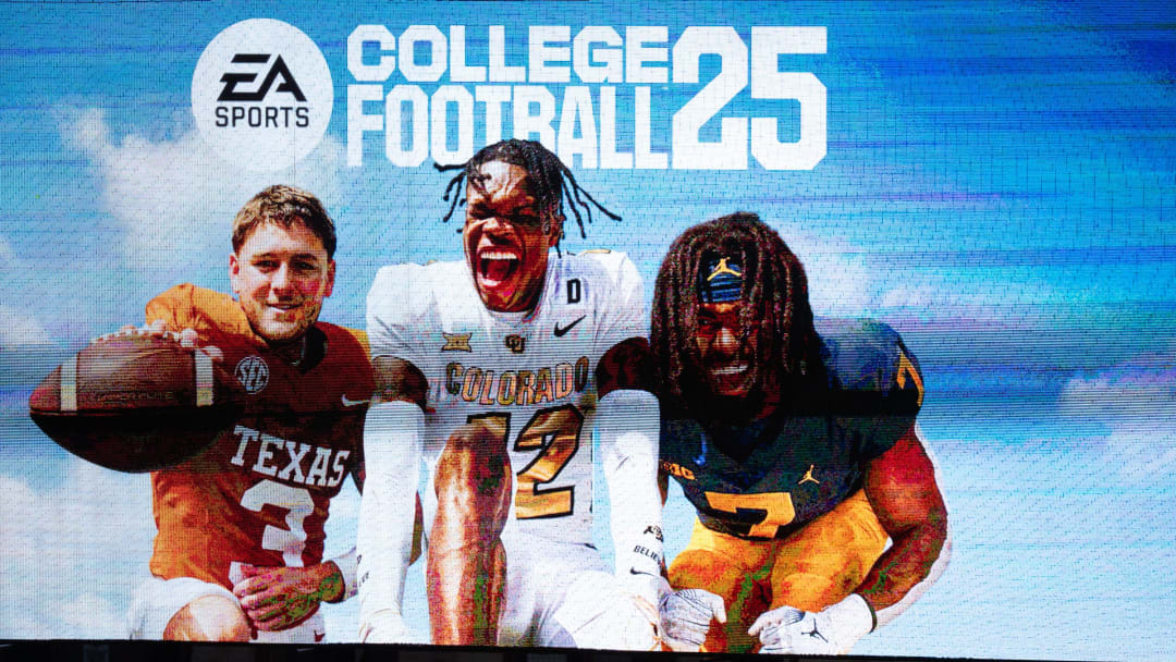 A commercial for the College Football 25 video game, featuring Texas Football quarterback Quinn Ewers plays during the fifth inning of the Longhorns' baseball game against the Kansas Jayhawks, Thursday, May 16, 2024 at UFCU Disch-Falk Field in Austin.