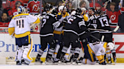 Nov 25, 2024; Newark, New Jersey, USA; The New Jersey Devils and the Nashville Predators fight after a hit by New Jersey Devils right wing Timo Meier (28) (not shown) during the third period at Prudential Center. Mandatory Credit: Ed Mulholland-Imagn Images