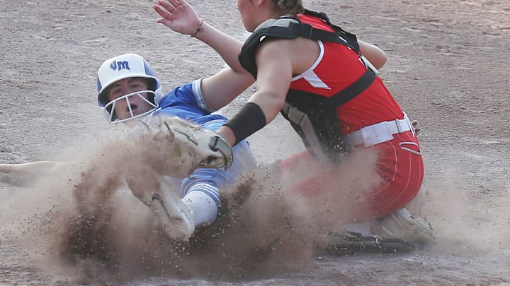 Van Meter's Finley Netten (sliding) is one of the top Iowa high school softball players in Class 2A. Van Meter's Finley Netten (sliding) is one of the top Iowa high school softball players in Class 2A.