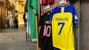 QATAR-FBL-MESSI-RONALDO