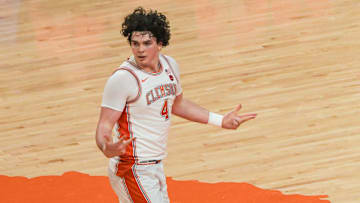 Feb 26, 2025; Clemson, South Carolina, USA;  Clemson senior forward Ian Schieffelin (4) reacts after making a three-point shot against Notre Dame during the first half at Littlejohn Coliseum. Mandatory Credit: Ken Ruinard-Imagn Images