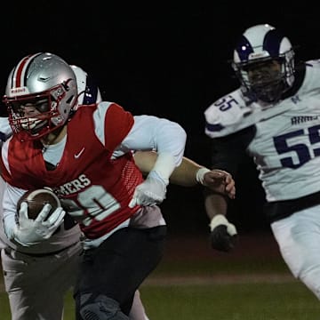 Dean Palazzolo (30) and the Somers football squad recorded a 35-7 win over Clarkstown North in the Section I Class A quarterfinals on Friday.