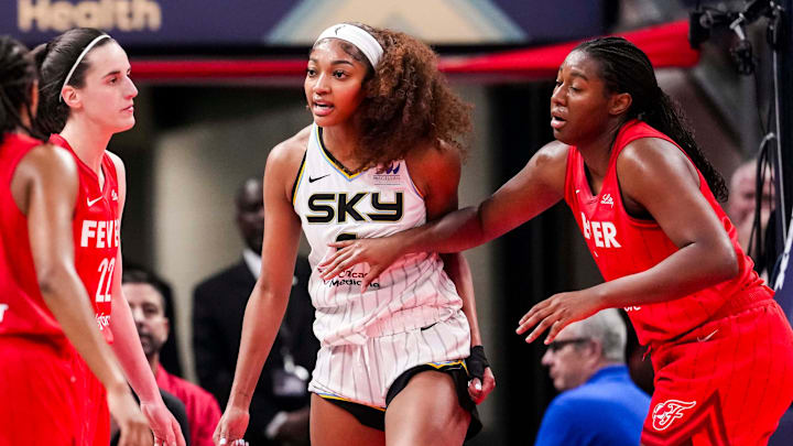 Chicago Sky forward Angel Reese (5) reacts to a flagrant foul from Indiana Fever guard Caitlin Clark (22) on Saturday, May 17, 2025, during a game between the Indiana Fever and the Chicago Sky at Gainbridge Fieldhouse in Indianapolis. The Indiana Fever defeated the Chicago Sky, 93-58.