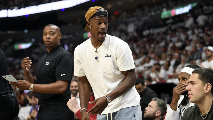 Apr 29, 2024; Miami, Florida, USA; Miami Heat forward Jimmy Butler (22) comments on the game from the bench during the first quarter of game four of the first round for the 2024 NBA playoffs, against the Boston Celtics, at Kaseya Center. Mandatory Credit: Michael Laughlin-USA TODAY Sports