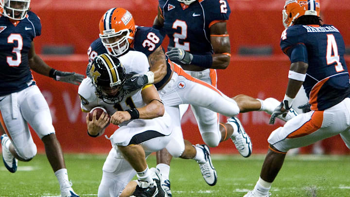 Sep 5, 2009; St. Louis, MO, USA; Illinois Fighting Illini linebacker Ian Thomas (38) sacks Missouri Tigers quarterback Blaine Gabbert (11) during the first half at the Edward Jones Dome. Missouri defeated Illinois 37-9. Mandatory Credit: Jeff Curry-Imagn Images