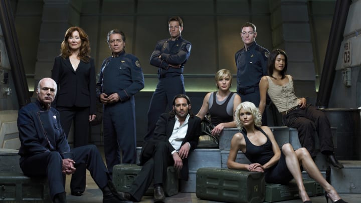 BATTLESTAR GALACTICA -- Season 3 -- Pictured: (l-r) Michael Hogan as Colonel Saul Tigh, Mary McDonnell as President Laura Roslin, Edward James Olmos as Admiral William Adama, Jamie Bamber as Captain Lee "Apollo" Adama, James Callis as Dr. Gaius Baltar, Kattee Sackhoff as Lt. Kara "Starbuck" Thrace, Tahmoh Penikett as Captain Karl "Helo" Agathon, Grace Park as Number Eight, Tricia Helfer as Number Six -- (Photo by: Justin Stephens/Syfy/NBCU Photo Bank)