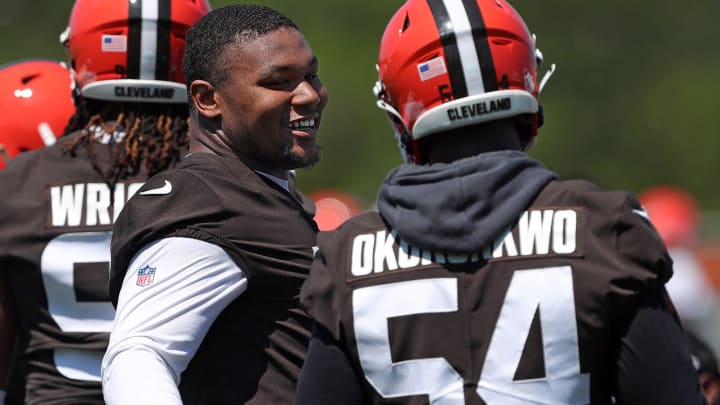 Browns defensive tackle Mike Hall Jr. (51) chats with defensive end Ogbo Okoronkwo during minicamp, Wednesday, June 12, 2024, in Berea.