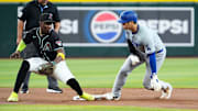 Los Angeles Dodgers Shohei Ohtani (17) steals second base against Arizona Diamondbacks shortstop Geraldo Perdomo (2) in the seventh inning at Chase Field on Sept. 2, 2024, in Phoenix.