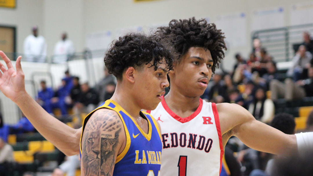 La Mirada’s Gene Roebuck (left) and Redondo Union’s Hudson Mayes body up before an in-bounds play the Classic at Damien on Friday, December 27, 2024.