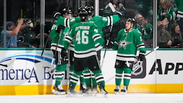 Feb 28, 2025; Dallas, Texas, USA;  The Dallas Stars celebrate after a goal scored by left wing Jason Robertson (21) against the Los Angeles Kings during the first period at American Airlines Center. Mandatory Credit: Chris Jones-Imagn Images