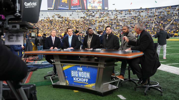 Nov 25, 2023; Ann Arbor, Michigan, USA; Former Ohio State head coach Urban Meyer talks on the sideline set of Fox Big Noon Kickoff prior to the NCAA football game between the Michigan Wolverines and the Ohio State Buckeyes at Michigan Stadium.