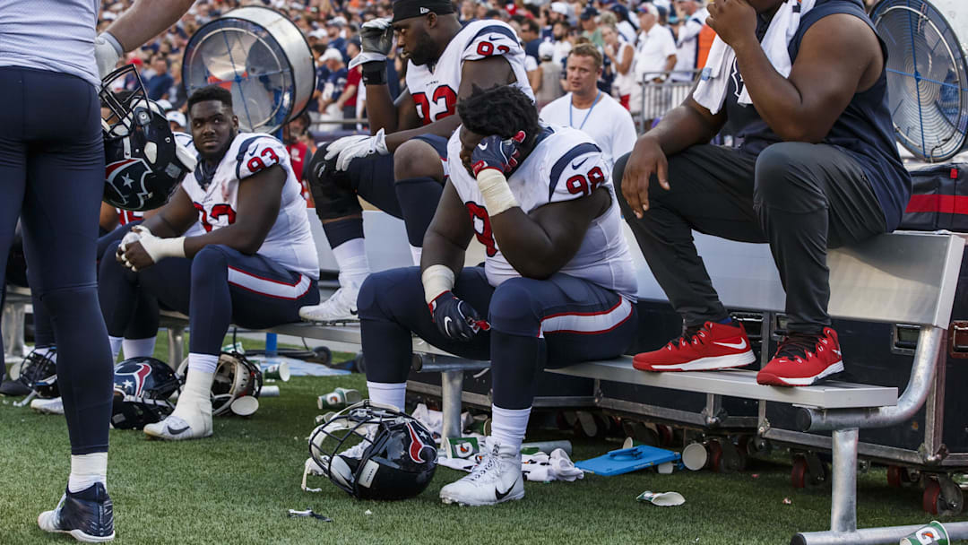 Sep 24, 2017; Foxborough, MA, USA; Houston Texans nose tackle D.J. Reader (98) and teammates react on the bench in the last seconds of play against the New England Patriots in the second half at Gillette Stadium. Mandatory Credit: David Butler II-Imagn Images