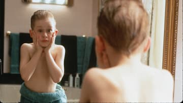 HOME ALONE - Eight year old Kevin MacAllister (Macaulay Culkin) gets lost in the shuffle as his large, upper-middle class suburban family rushes to make a plane that will ferry them off to their Christmas vacation in France; Kevin, having been banished to an attic room as punishment, is subsequently forgotten. At first this is a dream come true, as for the first time in his young life he has no one to answer to but himself, and he takes full advantage of his newfound freedom, eating junk food