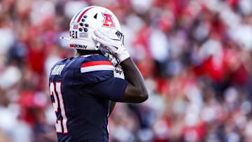 Sep 12, 2025; Tucson, Arizona, USA; Arizona Wildcats running back Ismail Mahdi (21) wears the retro helmet for the start of the game against the Kansas State Wildcats at Arizona Stadium. Mandatory Credit: Aryanna Frank-Imagn Images