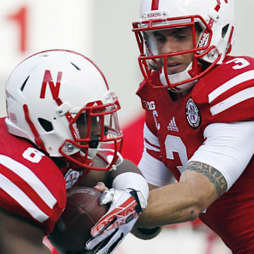 Taylor Martinez hands off to running back Ameer Abdullah against Southern Mississippi Sept. 7, 2013, the day Bo Pelini's home-field win streak reached 10 games at Memorial Stadium. 