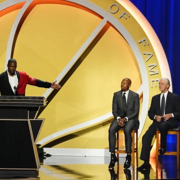 Sep 11, 2021; Springfield, MA, USA; Class of 2021 inductee Chris Bosh speaks alongside presenters Ray Allen and Pat Riley during the Naismith Memorial Basketball Hall of Fame Enshrinement at MassMutual Center. Mandatory Credit: David Butler II-USA TODAY Sports